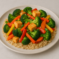 Veggie Stir-Fry with broccoli, peppers, carrots, tofu, brown rice